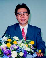 西京建一